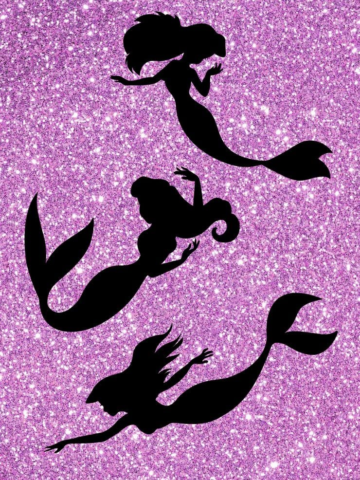 three black mermaid silhouettes on a purple glitter background