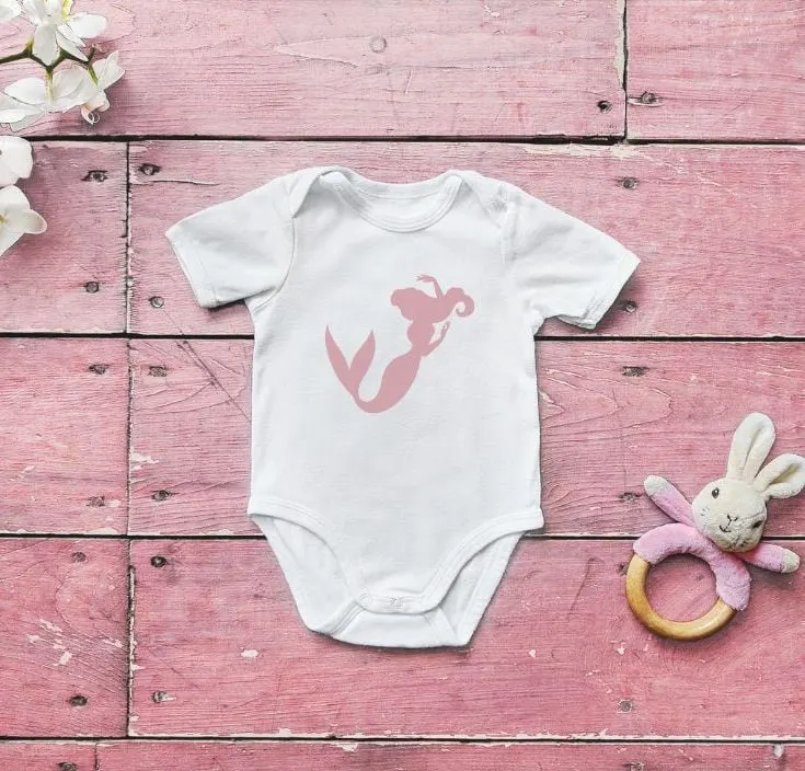 baby bodysuit with a mockup of the mermaid image