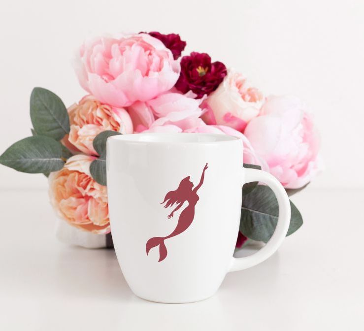 white coffee cup mockup showing the free mermaid svg file