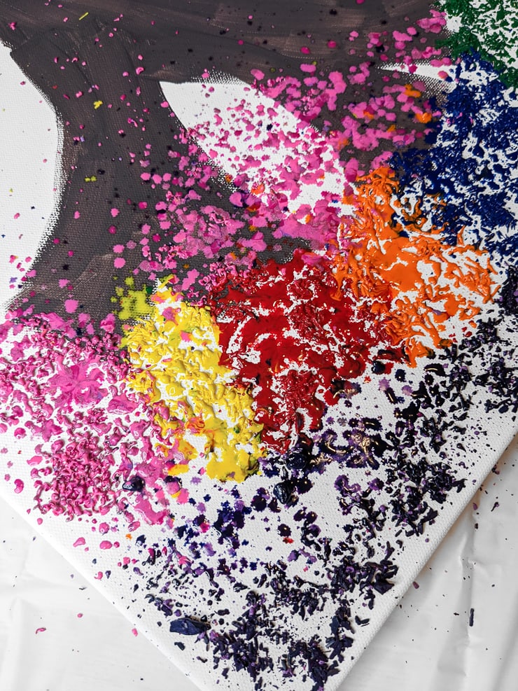 melting crayon shavings on a canvas of a tree